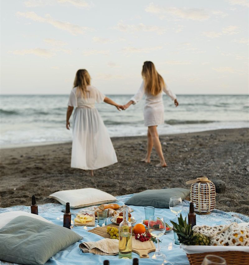 two-women-together-beach-party